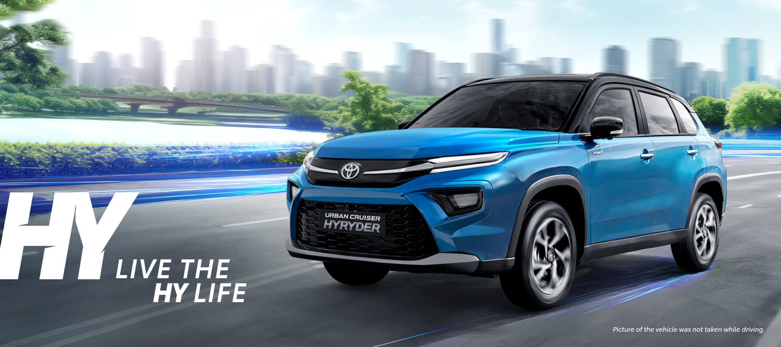 Toyota Urban Cruiser Hyryder lifestyle banner showing premium comfort, modern design, and best urban cruiser hyryder experience.