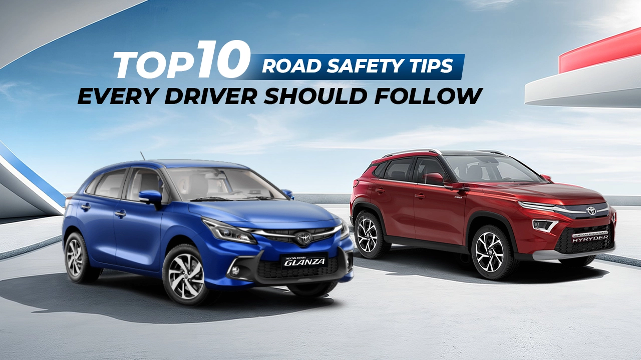 Driver following road safety rules while driving Glanza and Hyryder cars on city highway with seatbelt and proper lane discipline